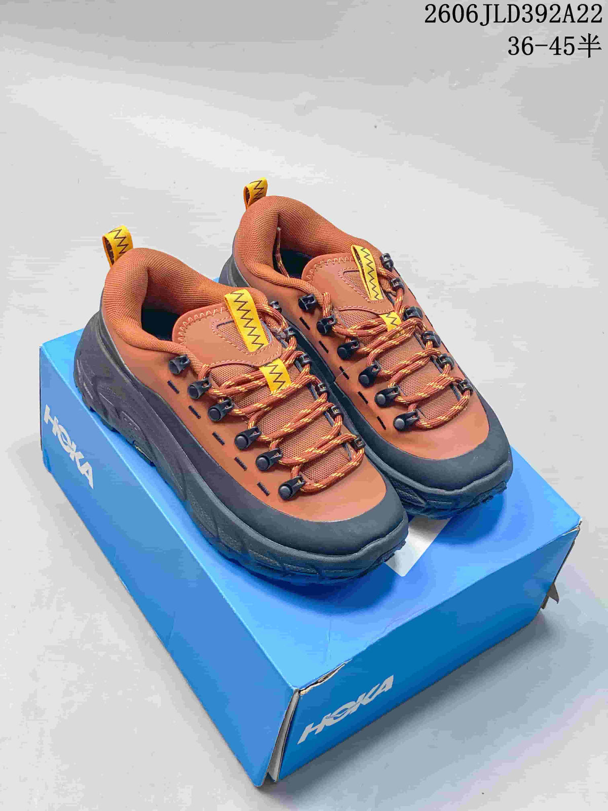 HOKA Tor Summit Low-Top Shoes in Rust and Charcoal