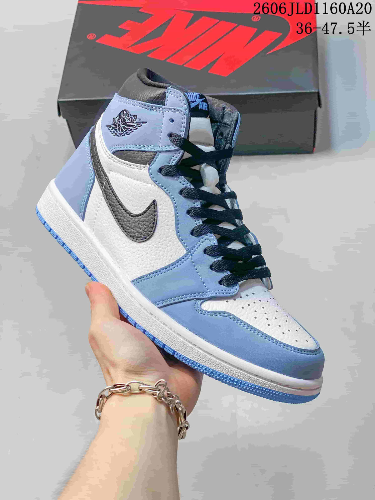 Jordan Air Jordan 1 High Sneakers in Blue and White