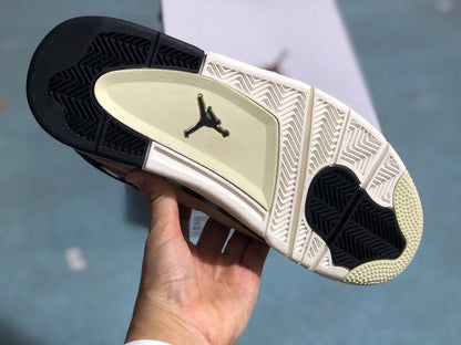 Underside of the sneaker showing a white and black herringbone-pattern outsole with a central Jumpman mark.