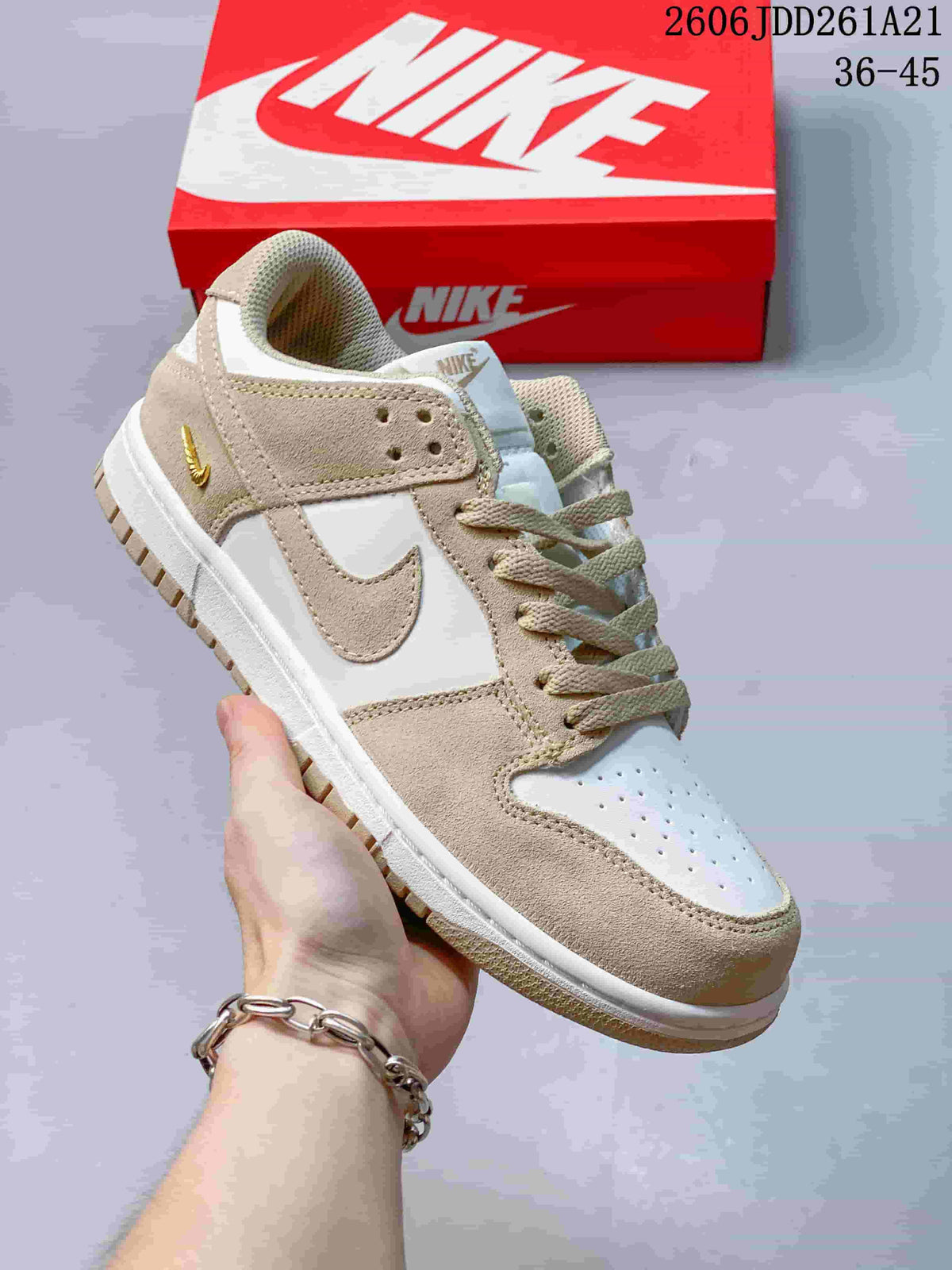 Nike Dunk Low Sneakers in White and Beige