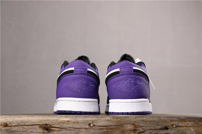 Rear-facing view of the pair showing matching purple heel panels and embossed logos.