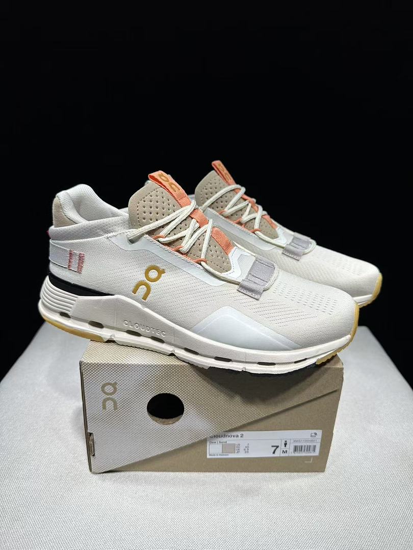 On Cloudnova 2 Sneakers in Ivory and Orange