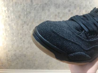 Close-up of the textured black toe area and translucent gum-colored outsole.