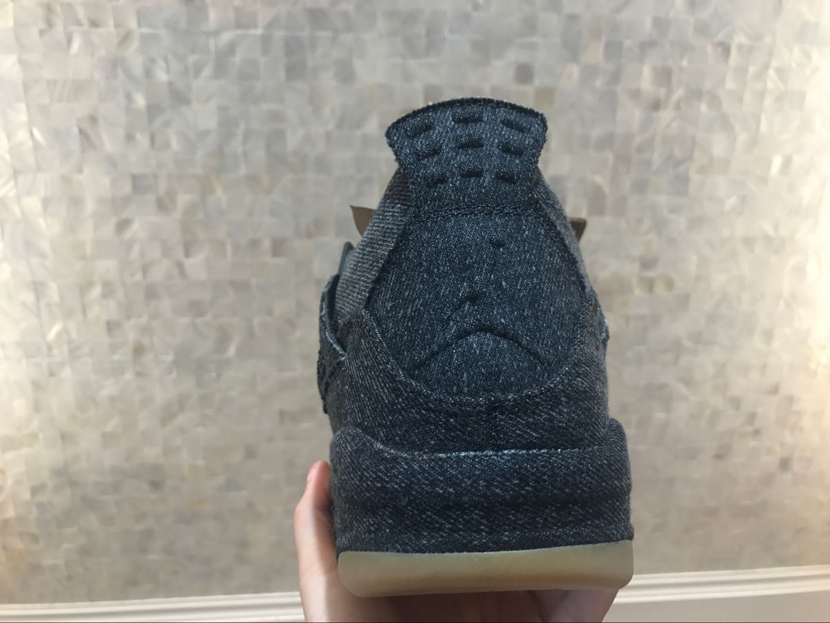 Rear view showing the black heel panel and gum-colored outsole.