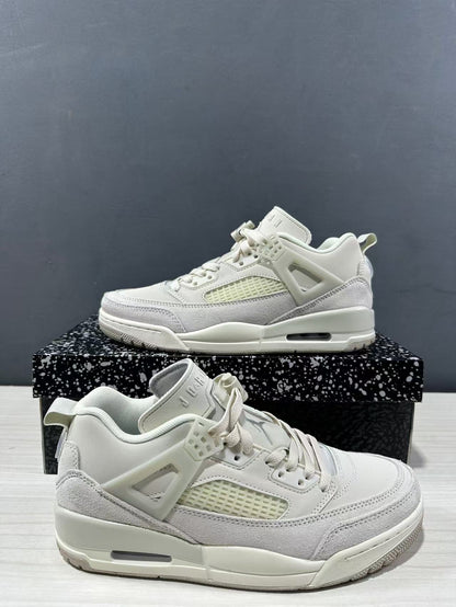 Angled side view highlighting the layered upper, side mesh panel, and cushioned-looking sole structure.