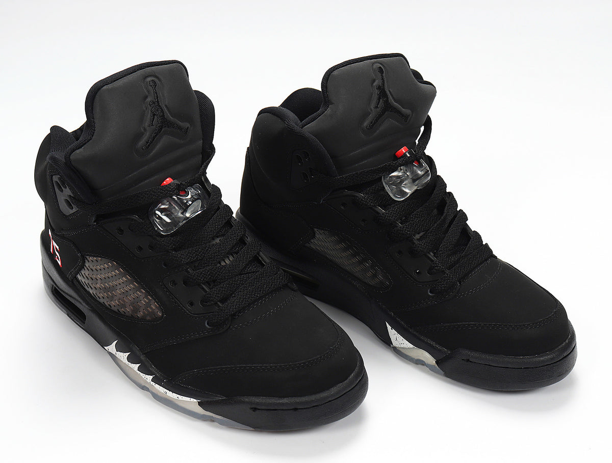 Pair of black Air Jordan 5 sneakers shown from an angled front view