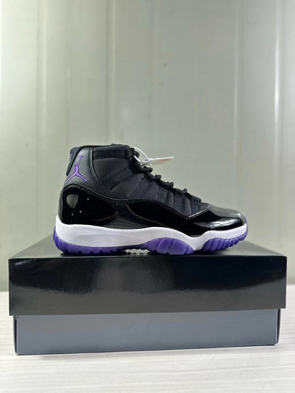 Side profile showing the glossy black upper, white midsole, purple outsole, and high-top collar.