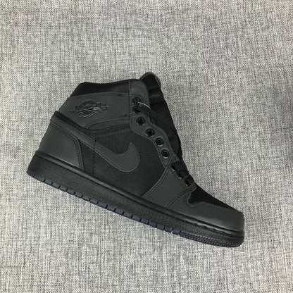 Angled side view highlighting the high-top collar, tonal side branding, and black outsole.