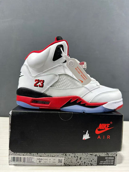 White, red, and black Air Jordan 5 sneaker displayed on its box; the box label shows EU 42, US Men 8.5, UK 7.5, and CM 26.5 for the photographed sample.