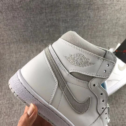 Close-up of the side panel showing the grey Swoosh and ankle wings emblem.