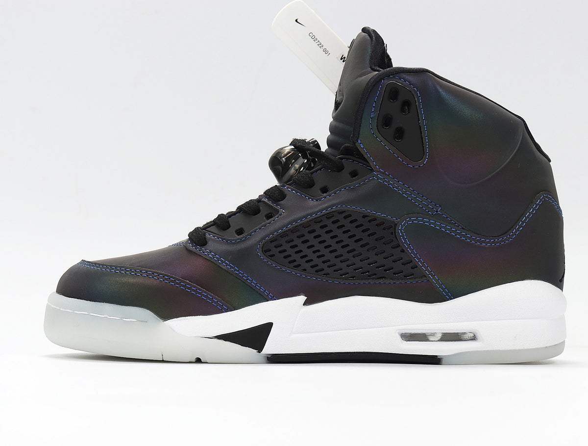 Side profile of a dark iridescent high-top sneaker with a white midsole.