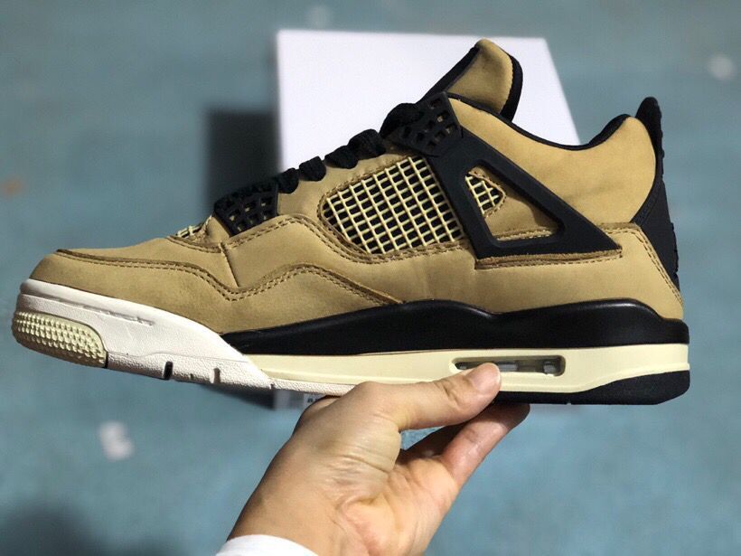 Side profile highlighting the mushroom-toned upper, black midsole section, white sole, and visible heel window.