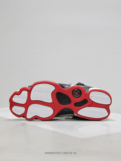 Outsole view showing a red-and-white tread pattern with black sections and a Jordan emblem.