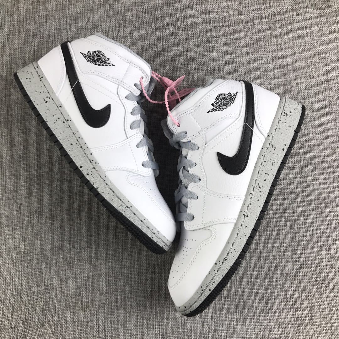 Top-down view of the pair showing the white uppers, black Swooshes, grey laces, and black outsoles.