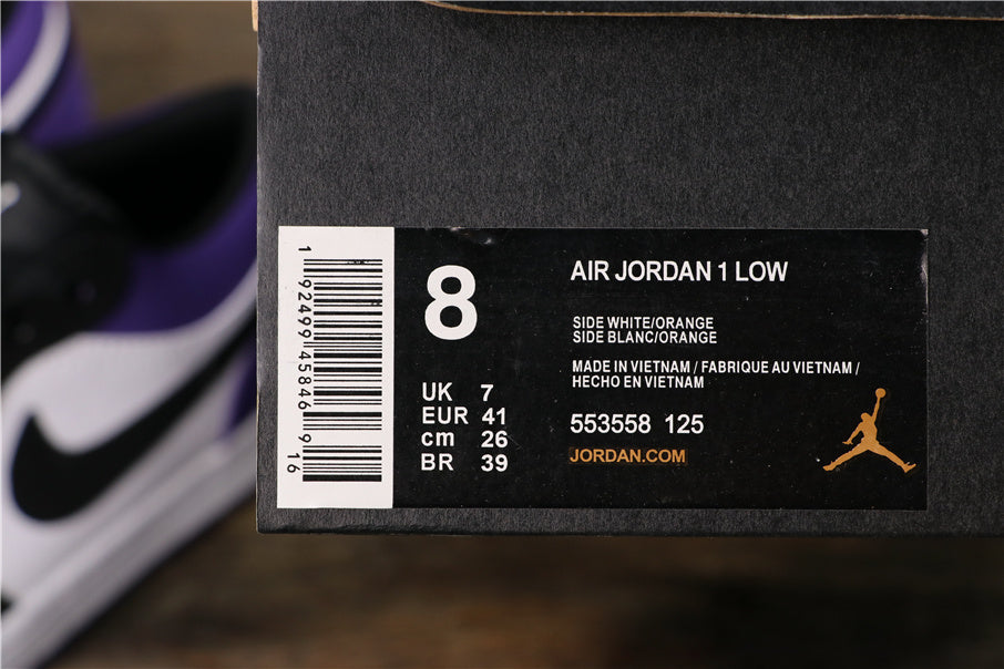 Close-up of the shoe box label showing Air Jordan 1 Low, color details, product code 553558-125, and sample size information.