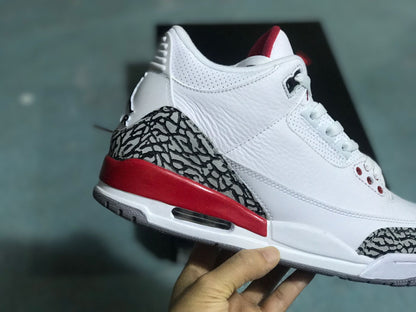 Close-up side view of the heel and elephant-print panels on a Jordan 3 Retro sneaker