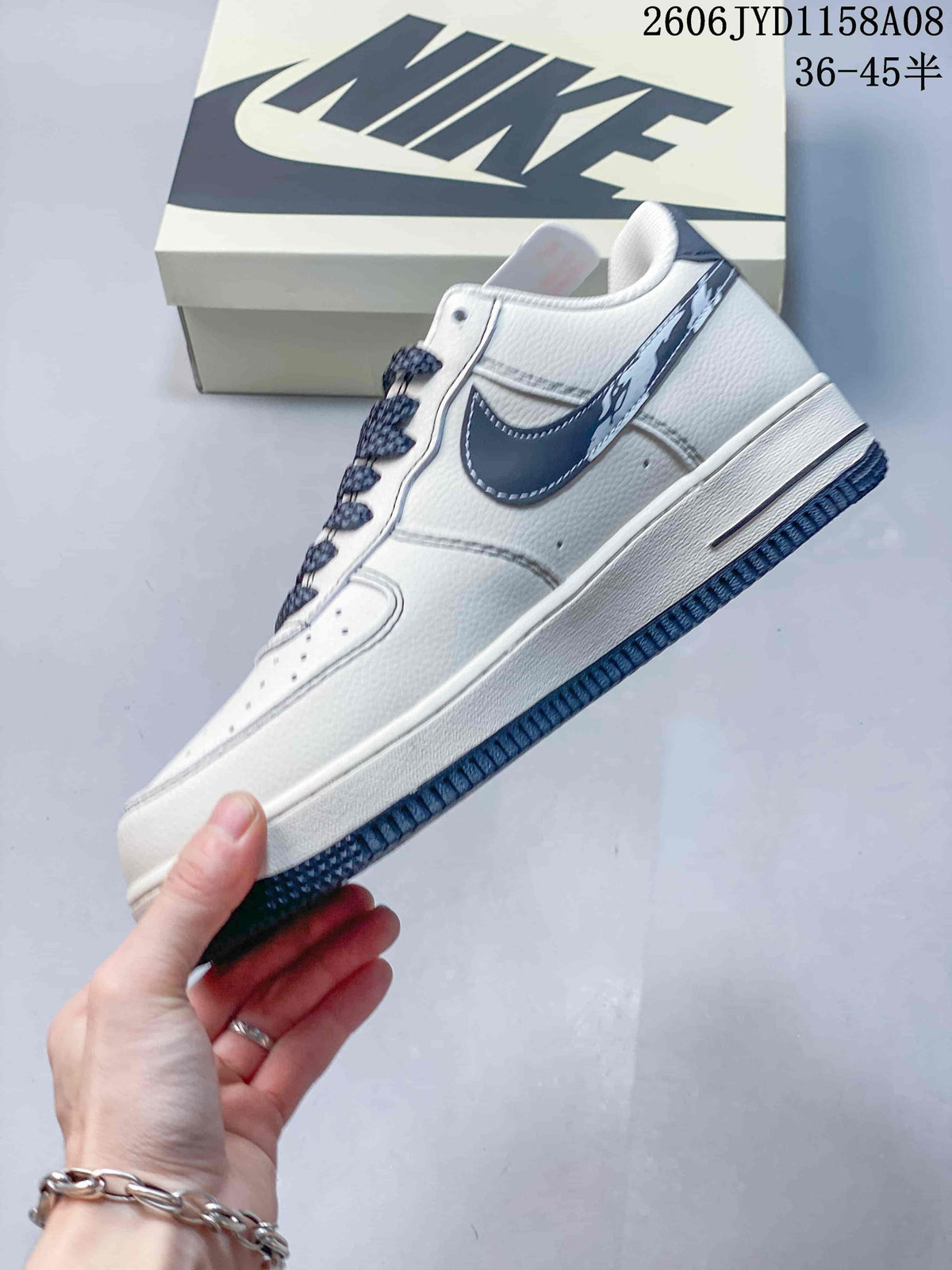 Nike Air Force 1 '07 Low Sneakers in White and Navy