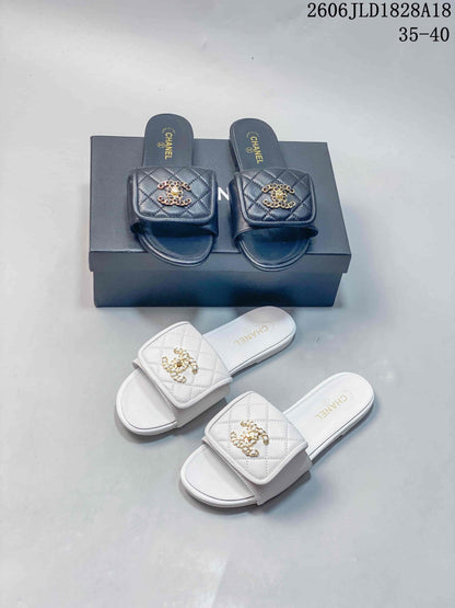 Chanel Quilted Double-C Slide Sandals, Black and White