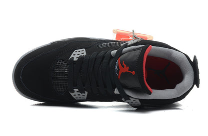 Top-down view showing black laces, mesh toe detail and red-lined tongue.