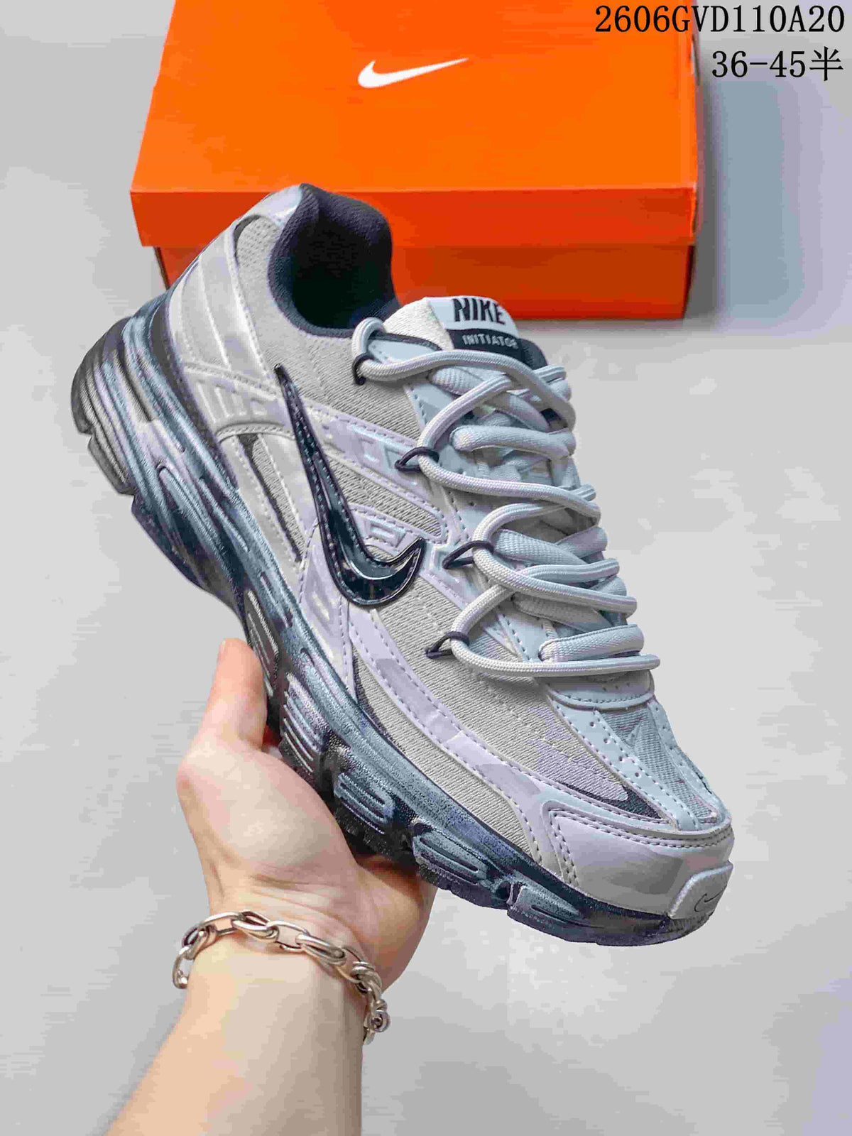 Nike Initiator Low-Top Sneakers in Silver and Black