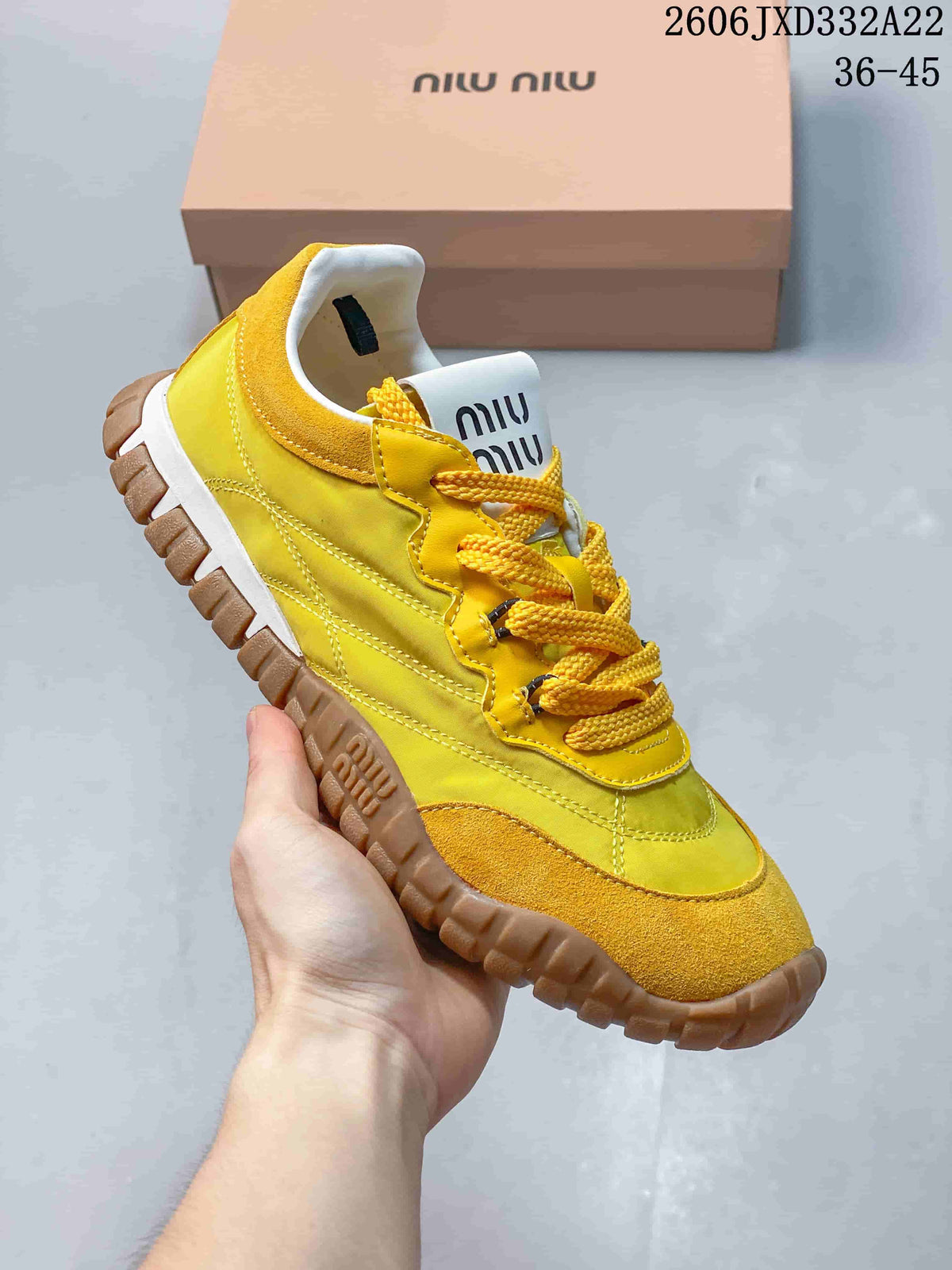 Miu Miu Tyre Low-Top Sneakers in Yellow