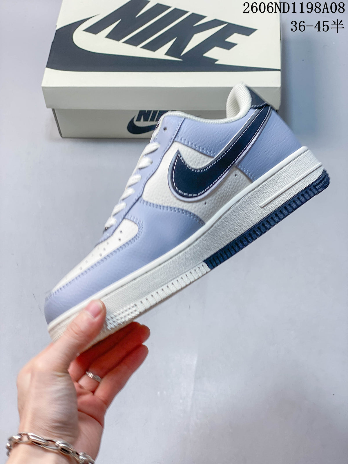 Nike Air Force 1 '07 Low Sneakers in White and Light Blue