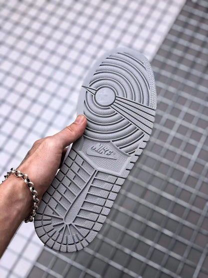 Outsole view showing the circular traction pattern and segmented tread.