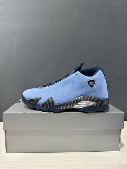 Single blue Jordan Air Jordan 14 sneaker shown in side profile with navy accents and textured side panels.