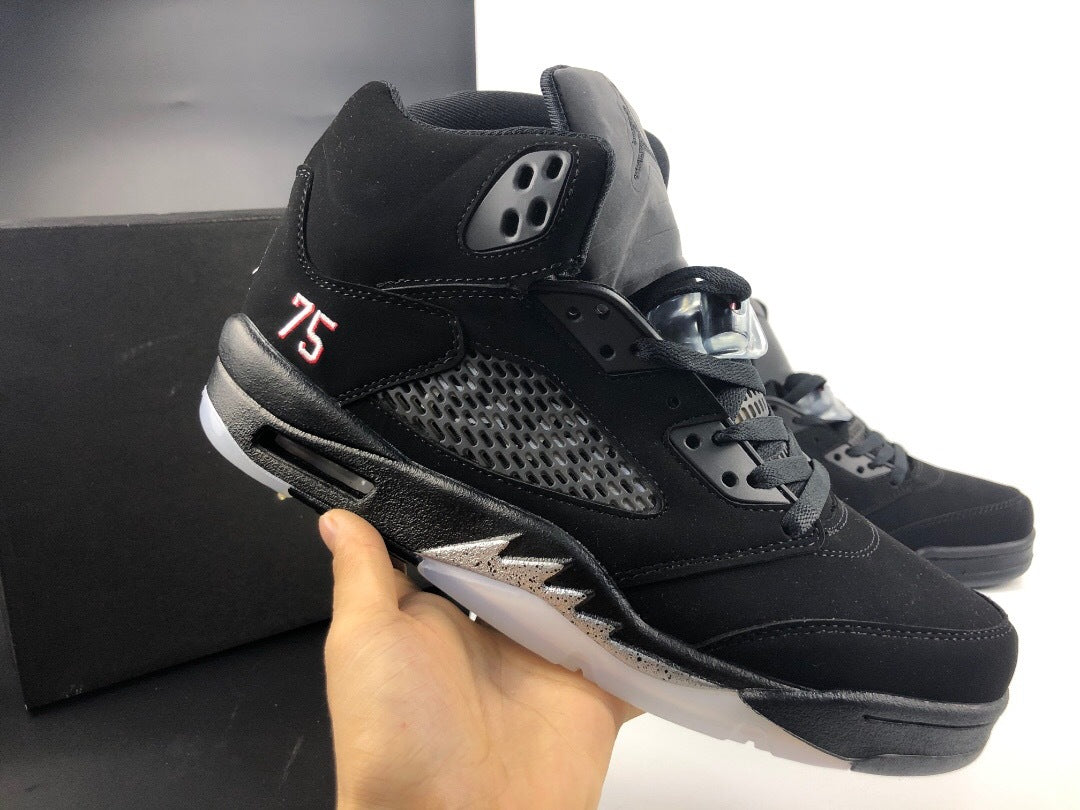 Angled side view highlighting the gray mesh panel, heel number 75, and translucent outsole.