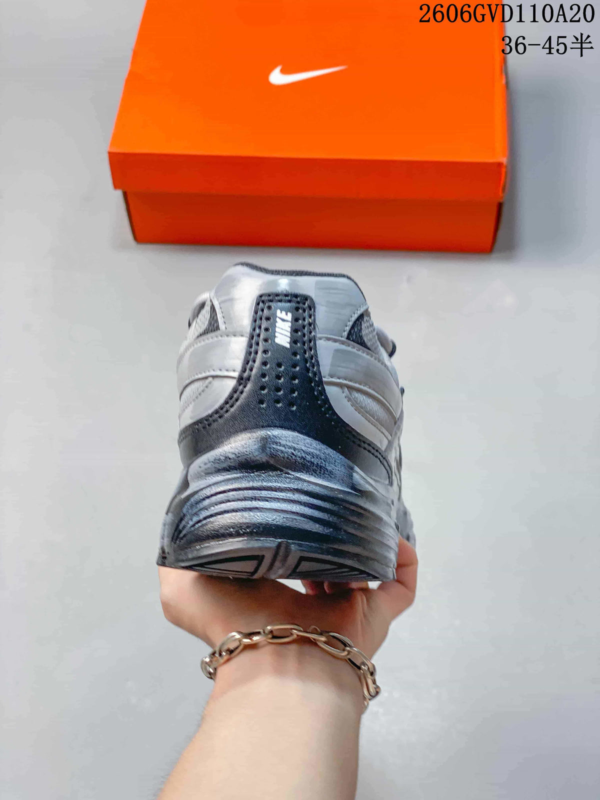 Nike Initiator Low-Top Sneakers in Silver and Black