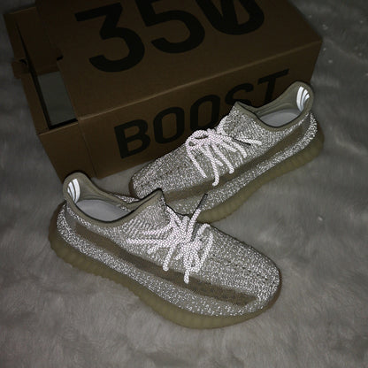 Flash-lit sneaker view with a Yeezy 350 shoebox, duplicated from image 5.