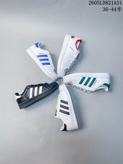 adidas Superstar Shell-Toe Sneakers in White and Color Accents
