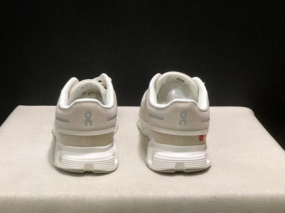 On Cloud 6 Sneakers in Pearl White