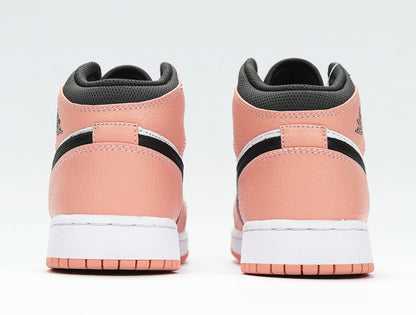 Rear view showing the quartz pink heel panels, black collar trim, white midsoles, and pink outsoles.
