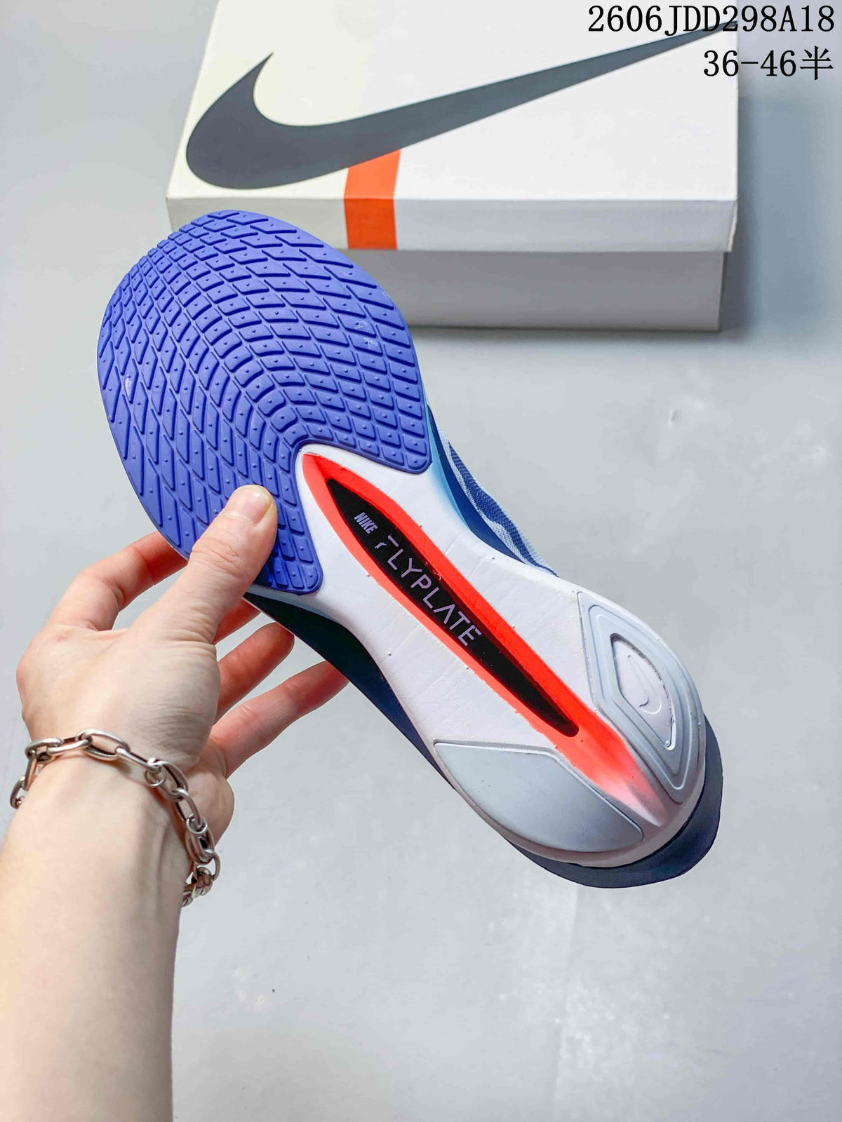 Nike ZoomX Vaporfly NEXT% 4 Road Racing Shoes, White and Blue