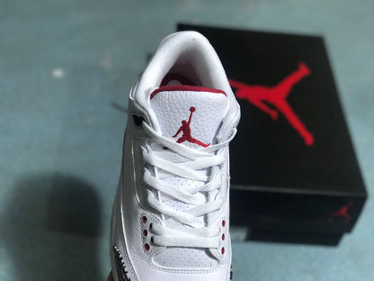 Front view showing white laces, perforated panels, and red tongue trim on a Jordan 3 Retro sneaker