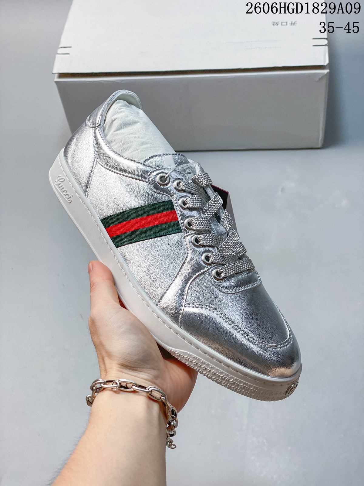 Gucci Silver Low-Top Sneakers with Green-Red Web Stripe