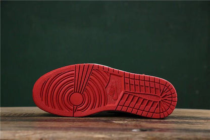 Close-up of the red outsole tread pattern.
