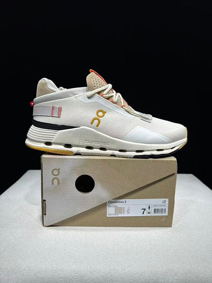 On Cloudnova 2 Sneakers in Ivory and Orange