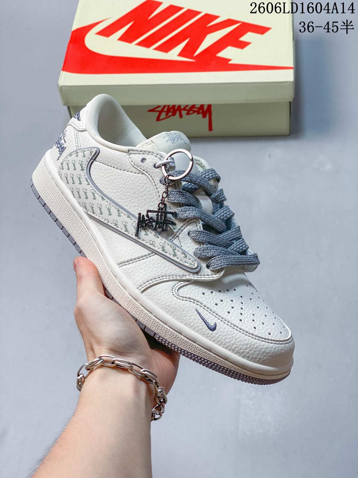 Travis Scott x Jordan 1 Low Sneakers in Ivory and Gray