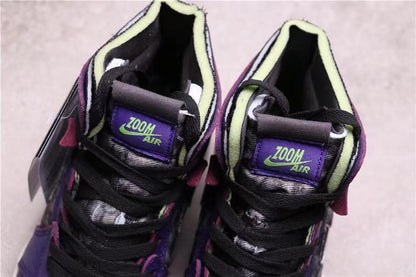 Top view showing black laces, purple tongue panels, and Zoom Air branding.