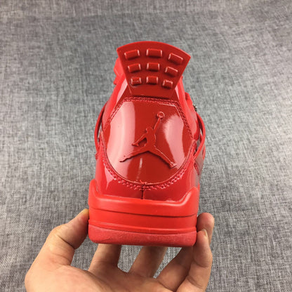 Rear view of a red sneaker showing the raised Jordan logo on the heel and molded heel tab.