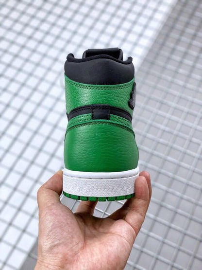 Rear view showing the green heel, black collar, white midsole, and green outsole.