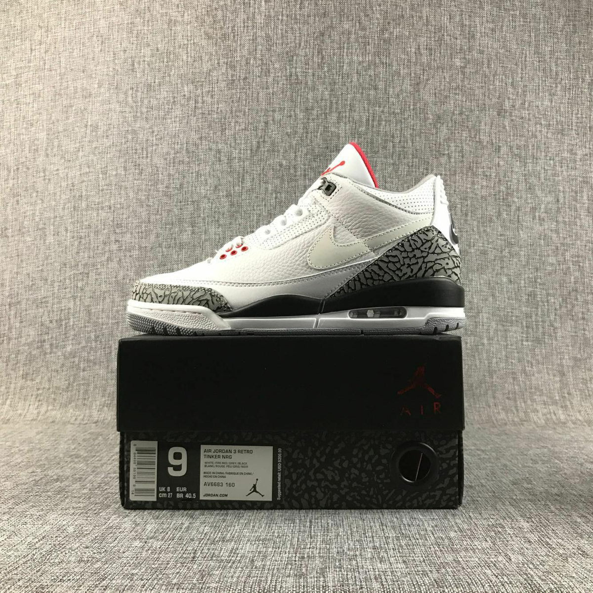 Side profile of the sneaker displayed on a box; the visible label shows AIR JORDAN 3 RETRO, size 9, EU 40.5, UK 8, and CM 27.