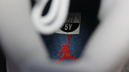 Close-up showing the interior size marking labeled “BOYS SIZE 5Y”.