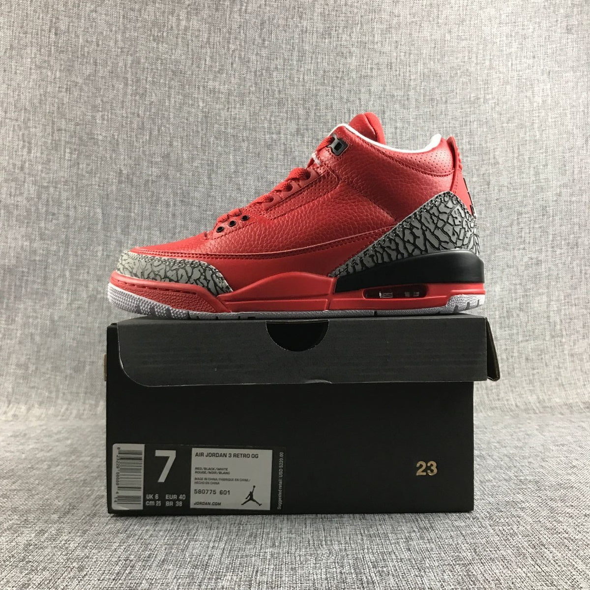 Red Air Jordan 3 displayed on a shoebox labeled Air Jordan 3 Retro OG, Red/Black/White, style code 580775 601, and EUR 40.