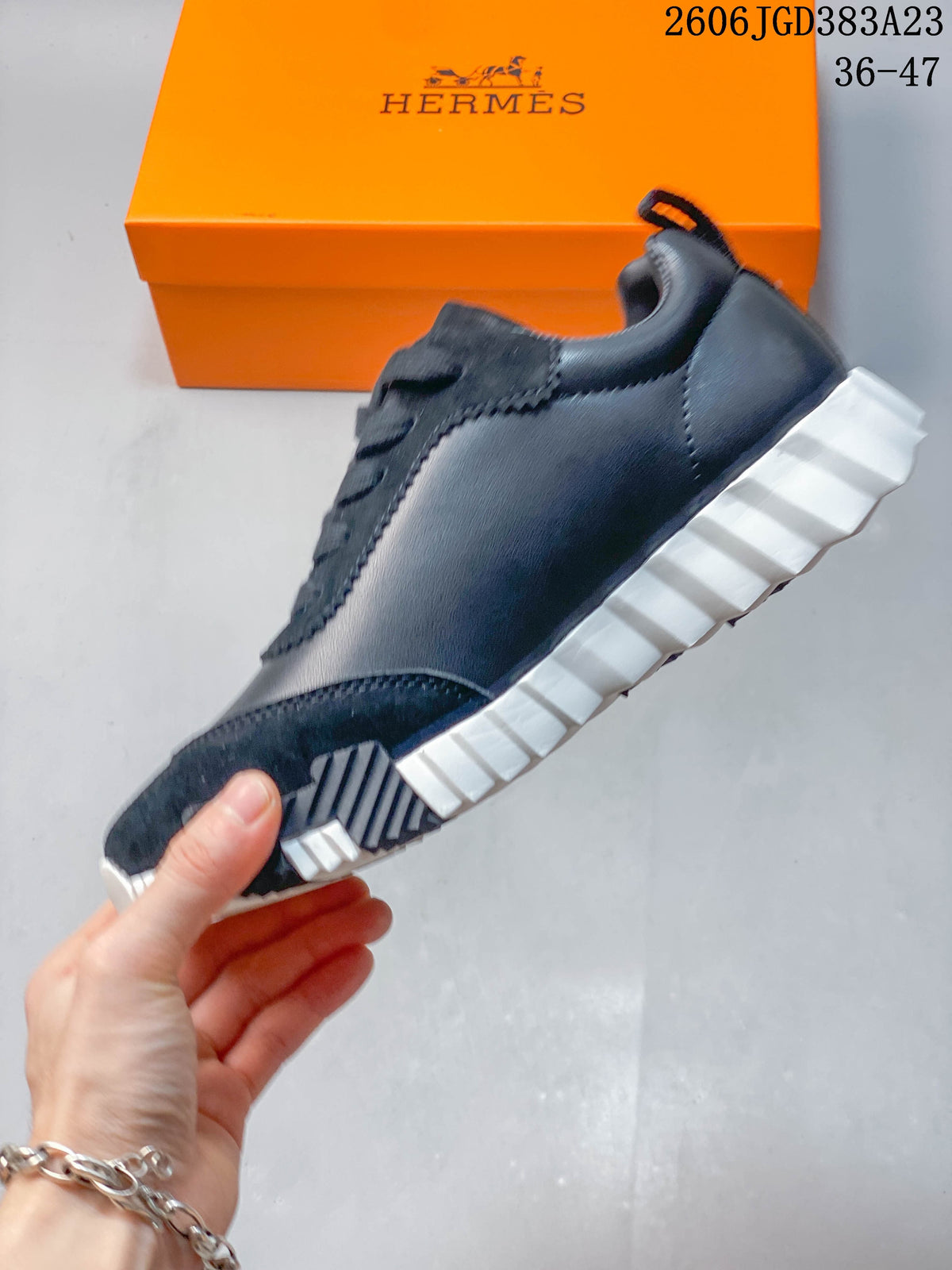 Hermès Low-Top Sneakers in Navy and White
