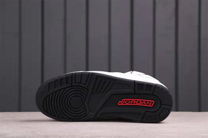 Bottom view showing the black patterned outsole with red Jordan branding