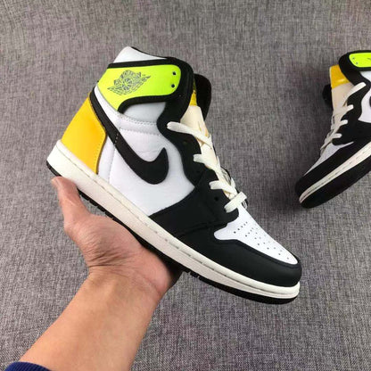 Close-up side view of a Volt Gold, black and white high-top Jordan sneaker.