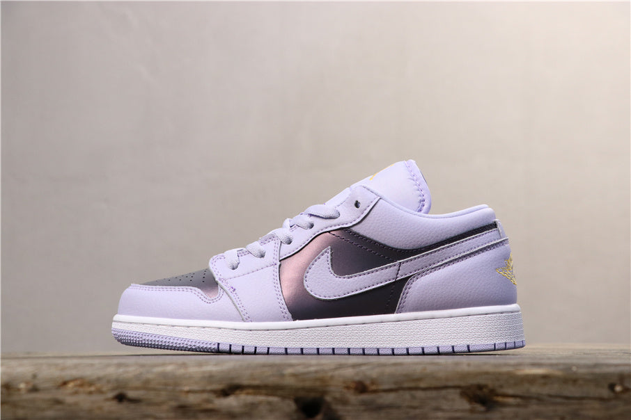Opposite side profile showing the light purple upper, dark side panel, Swoosh, metallic toe detail, and heel branding.